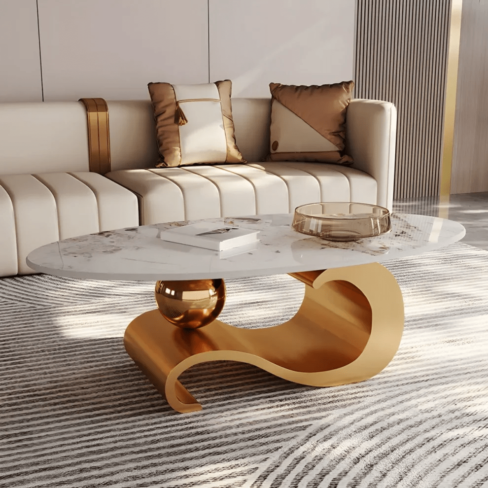 Modanio Nova oval coffee table with PVD gold finish and marble top for luxury living rooms