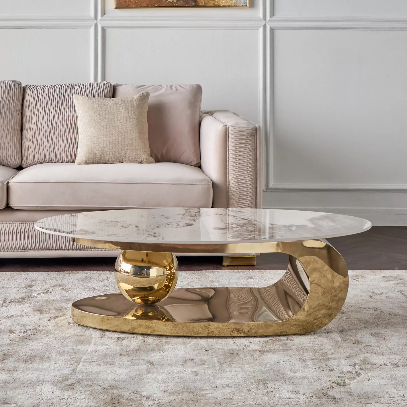 Modern luxury oval coffee table with marble top and gold stainless steel base by Modanio